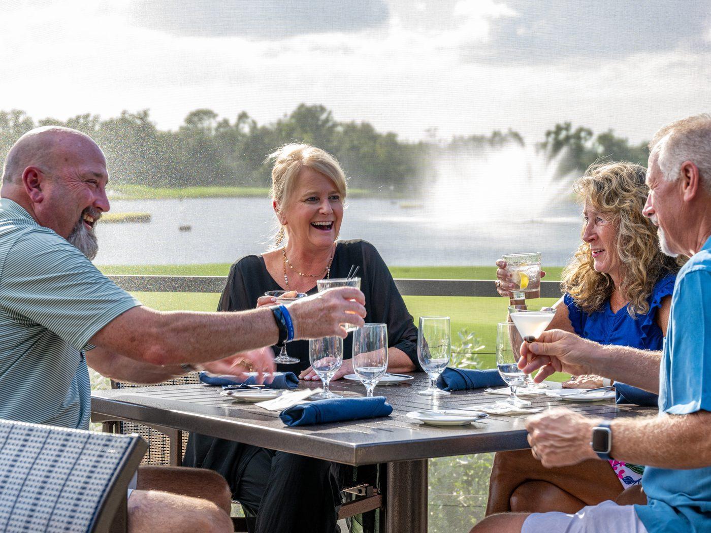 Members enjoying al-fresco patio dining at Heritage Oaks