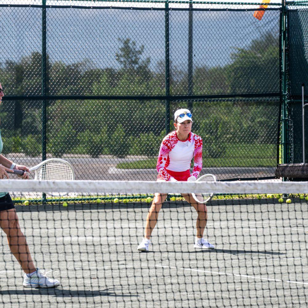 Members playing tennis